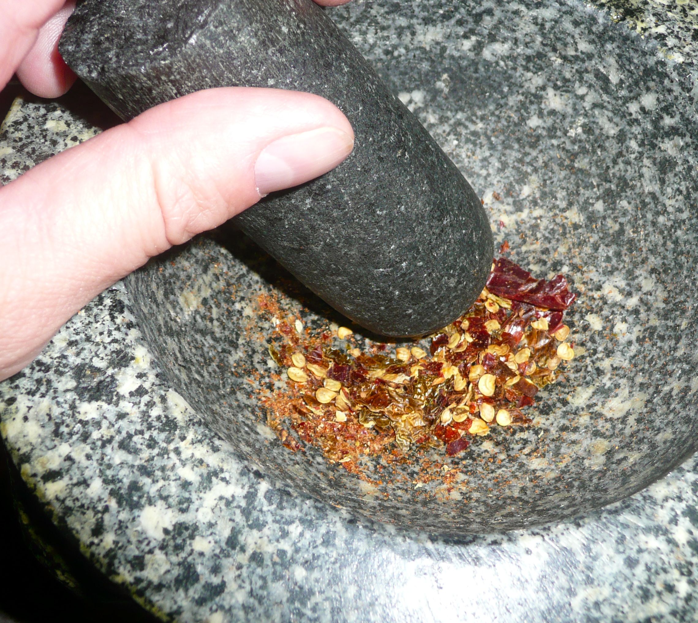 crushing chillies